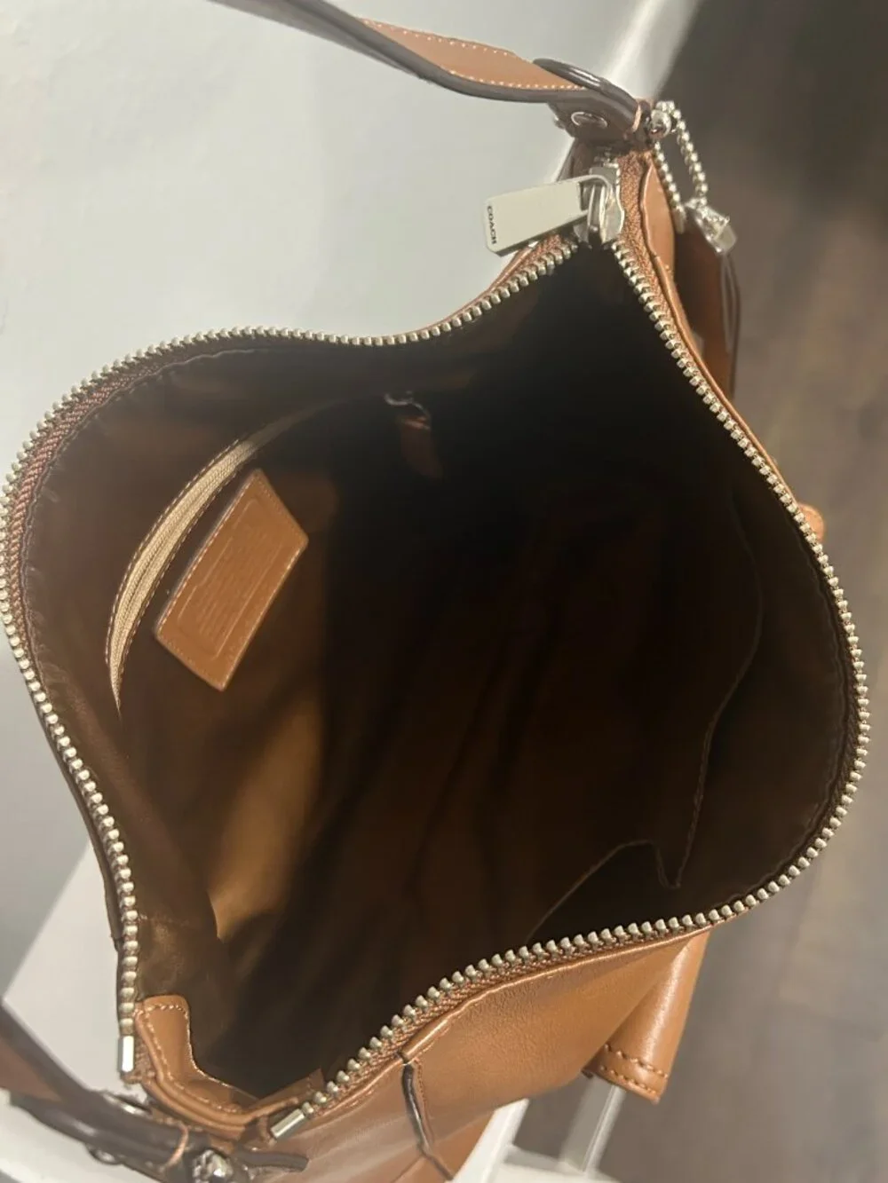 Vintage coach leather hobo in color camel with silver hardware.